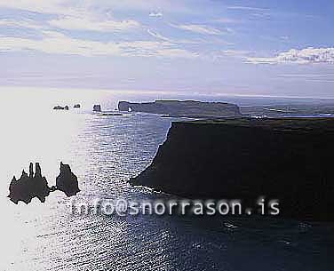 hs011048-01.jpg
Bergs in the sea, Reynisdrangar and Dyrhólaey in Background, south coast of  Iceland